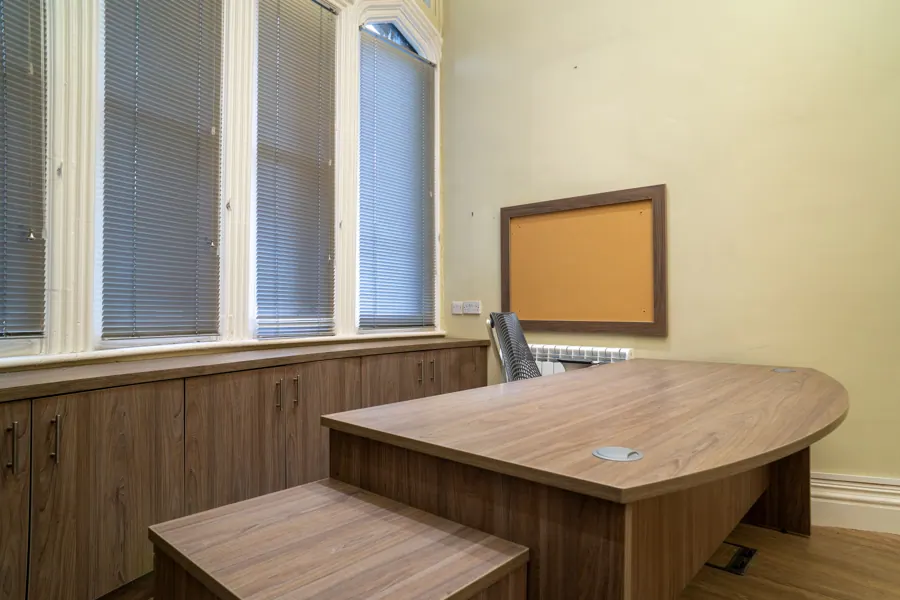 Office 01 — curved desk by the window