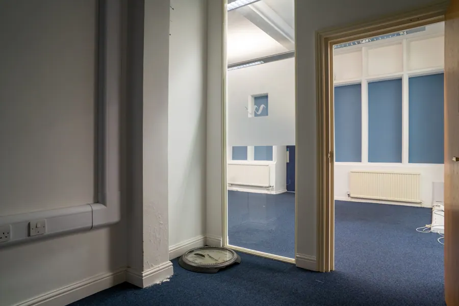 Office 02 — private room through the door