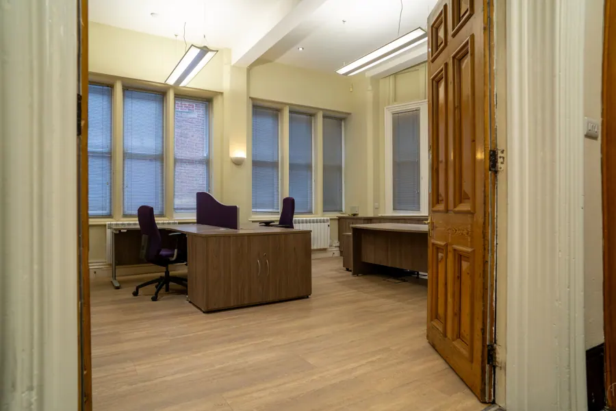 Office 01 — view through the panelled door