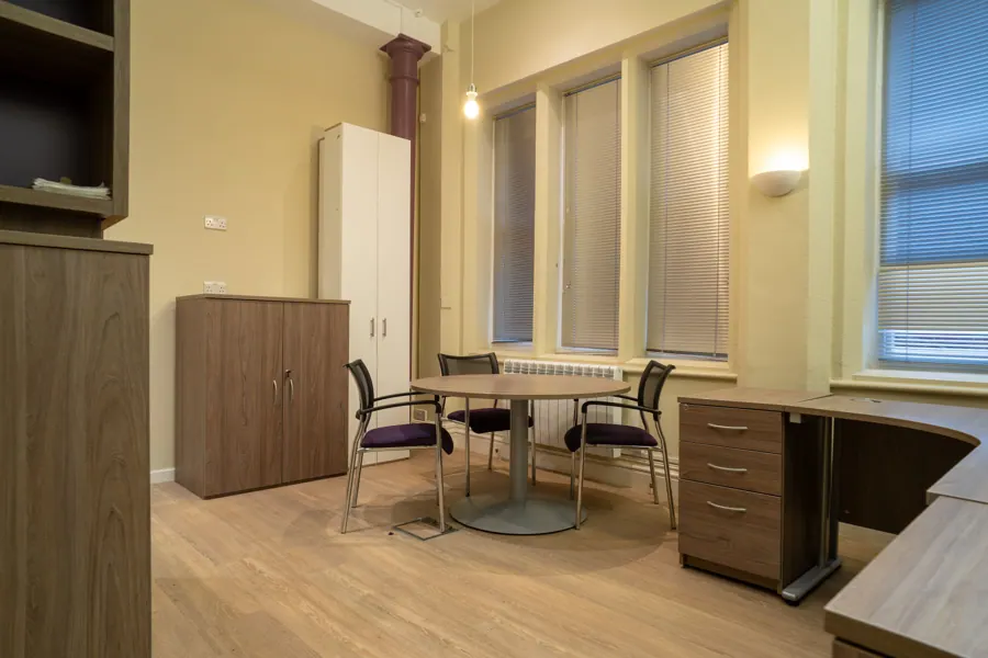 Office 01 — meeting table corner