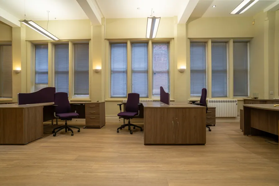 Office 01 — furnished open office with tall windows
