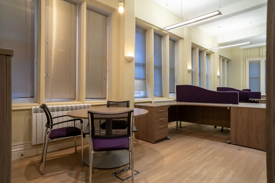 Office 01 — meeting table and desks