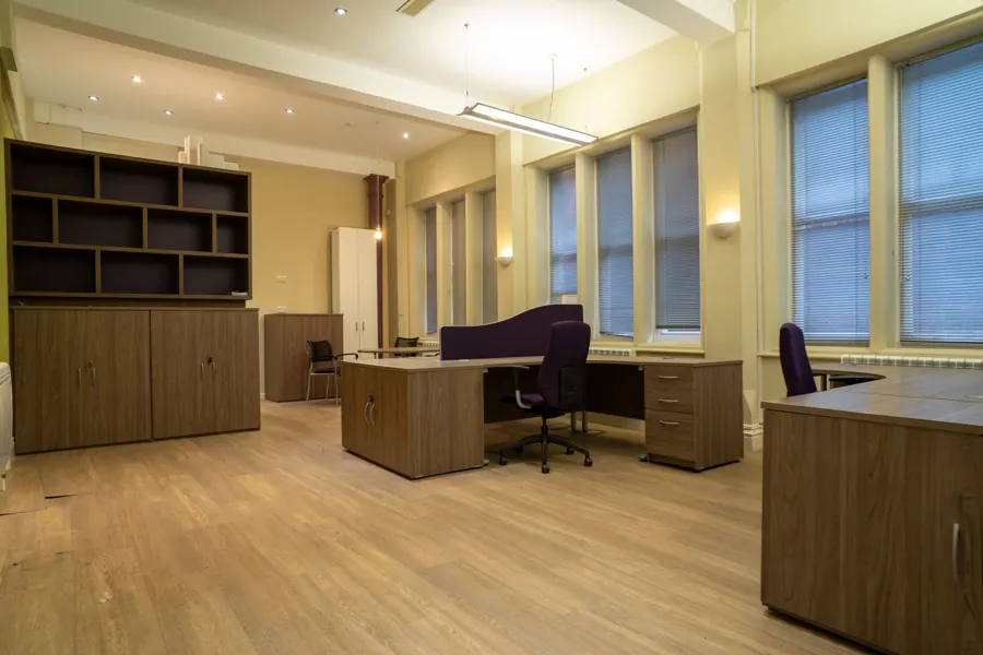 Office 01 — storage wall and desks